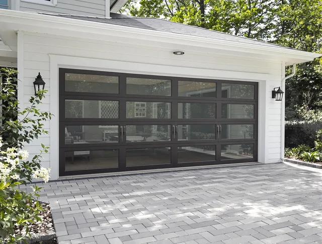 Stoneham Garage Door Repair design specialist presenting custom garage door options to Stoneham homeowner