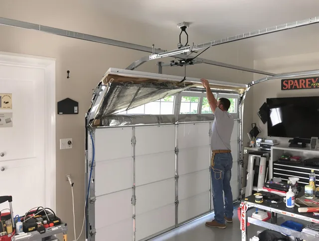 Garage door section replacement by Stoneham Garage Door Repair in Stoneham
